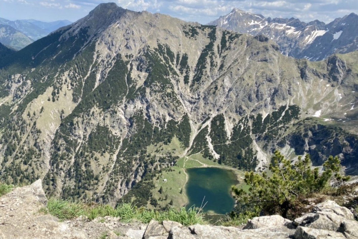 Aerial view from Rubihorn down to the lower Gaisalpsee, turquoise water in the mountain cirque, Allgäu Alps in the background